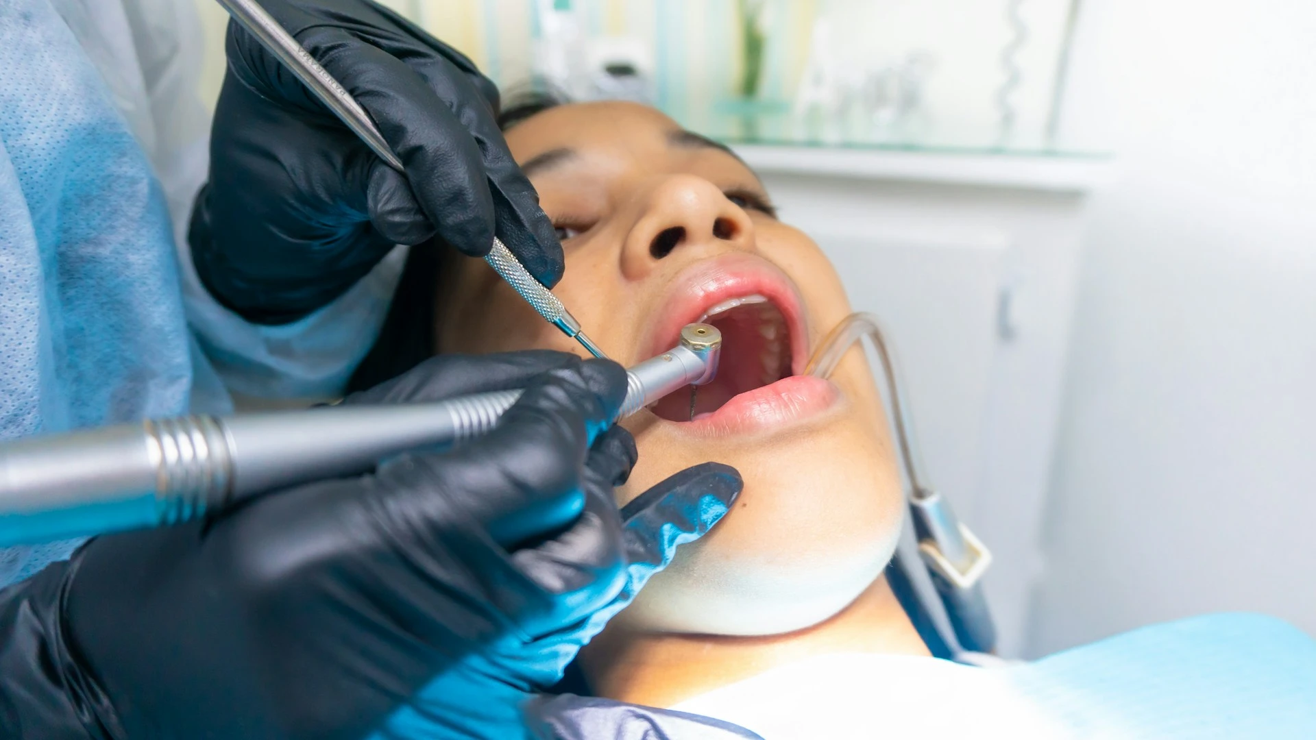 Dentist operating on a patient
