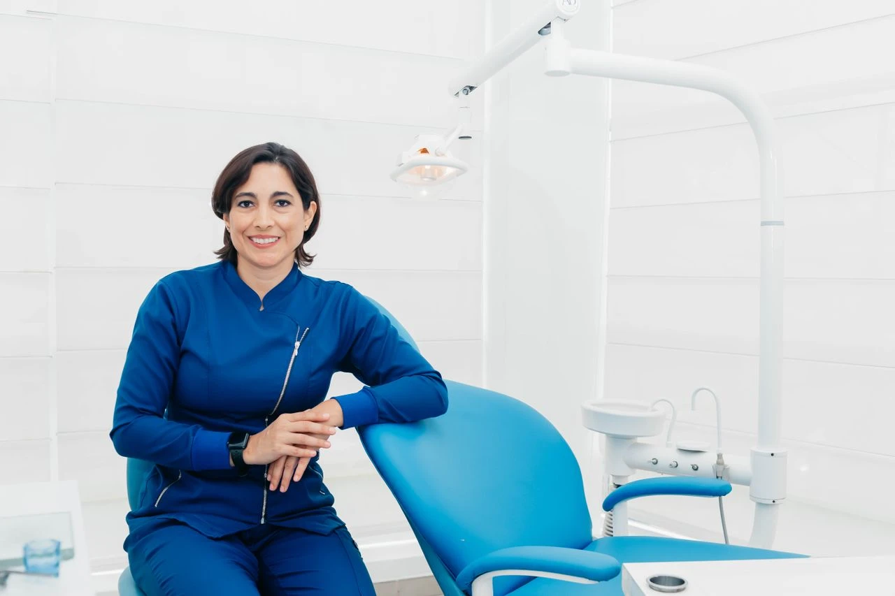Dentist sitting in a modern dental clinic