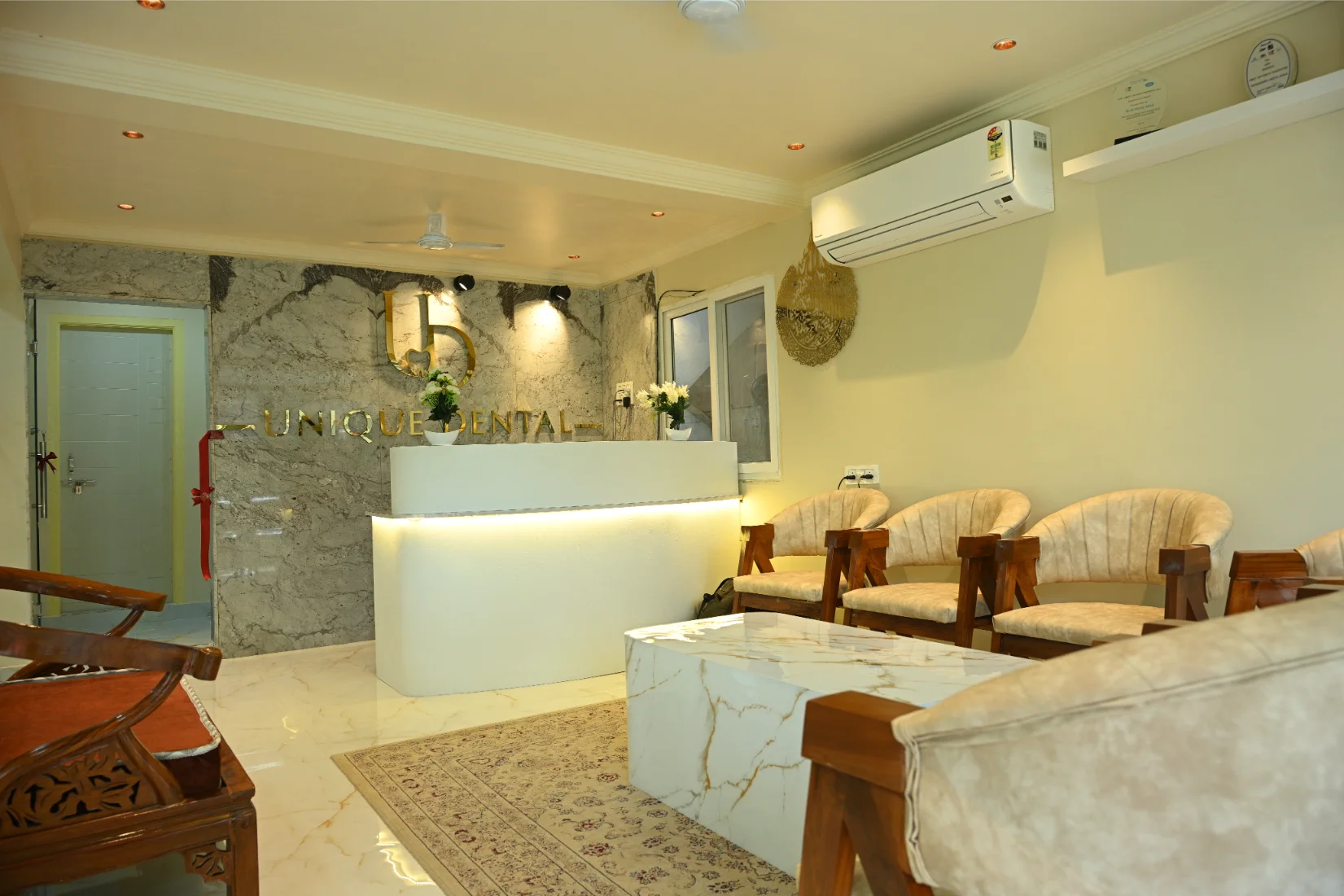 Reception desk and patient waiting area at Unique Dental clinic in Moula Ali, Hyderabad